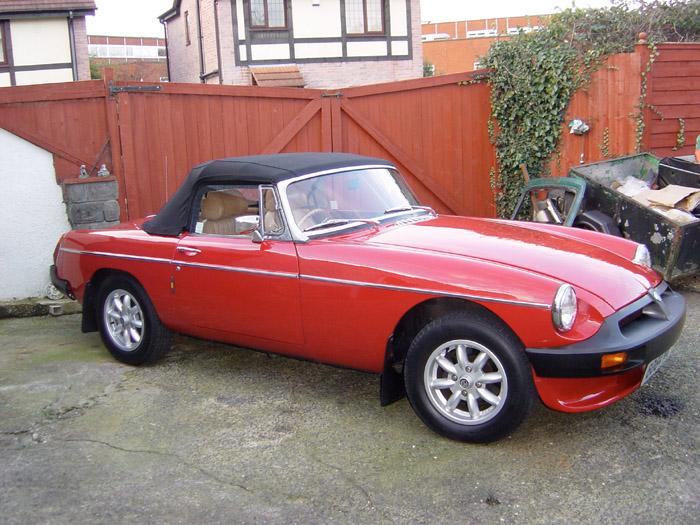 These are a few  pictures of my 1975 Tartan Red, fully restored MGB.  As you can see it has a cockpit and body to die for. Recently I was driving through a town centre behind an open top Audi TT. when a group of teenagers shouted &quot;Lovely car mate&quot;. The TT owner turned around to thank them to find that they were taking to me not him! Long may it last!