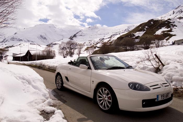 Roof down motoring in the Swiss mountains, this was taken on the Furka Pass ( just before the road was closed off ) above Andermatt