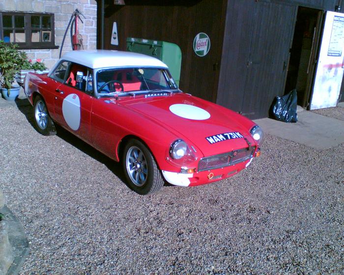 My 1971 B-roadster was tired and worn out in 2003. Following £10K+ renovation by AJ Restorations this is the 2007 image. Tasteful bodywork (perfect panel gaps), no chrome, sebring fr&amp;rear, bespoke rollcage, works hardtop, susp.  &amp; brake tweeks, 1840 Oselli based engine, Weber, side exhaust,  15&quot; minilites - no am not racing it - just posing!!
