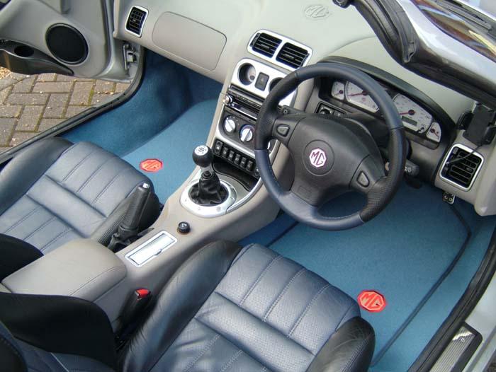 New carpets, Steering wheel and Chrome instrument surrounds.