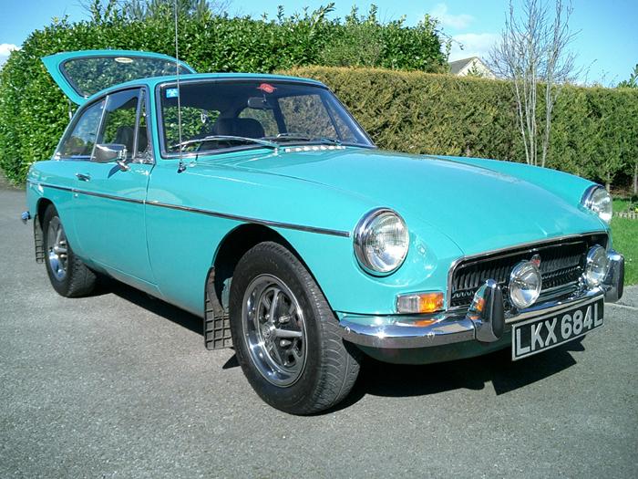 This is a 1972 car, the only year that Aqua was available on the MGB models. It certainly is a refreshing change from the standard colours. This one is in nice condition and has won many awards.