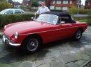 Posing outside the house with my 1972 MGB Roadster. Fantastic little car.