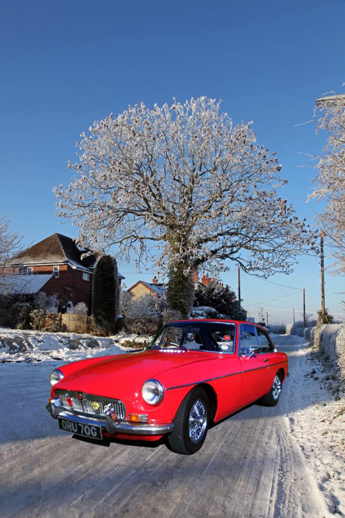 My pride and joy on a snowy lane in my Village(Photoshopped Image)Not too long after its return from the 50MGB Celebrations at Blenheim Palace