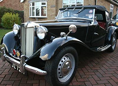 Our MG TD that we purchased to replace our ealier Austin 7 RN Box Saloon
