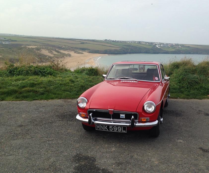 My MGB GT overlooking Crantock beach, Cornwall.